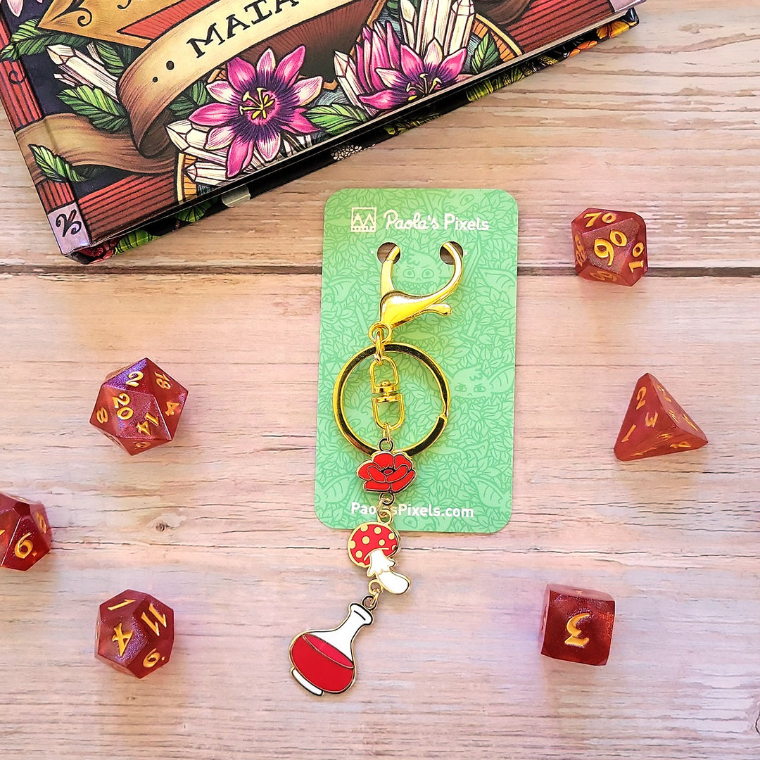 Red Potion Enamel Keychain - Geeky merchandise for people who play D&D - Merch to wear and cute accessories and stationery Paola's Pixels