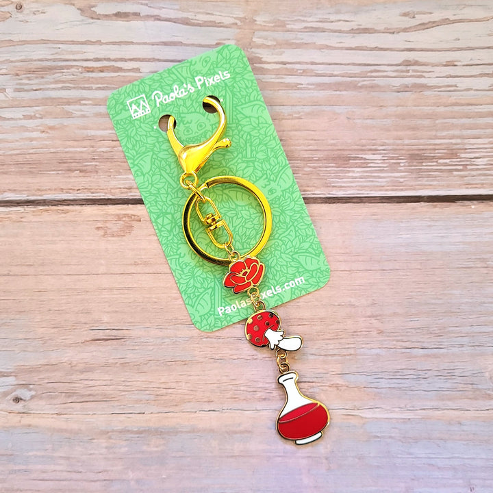 Red Potion Enamel Keychain - Geeky merchandise for people who play D&D - Merch to wear and cute accessories and stationery Paola's Pixels