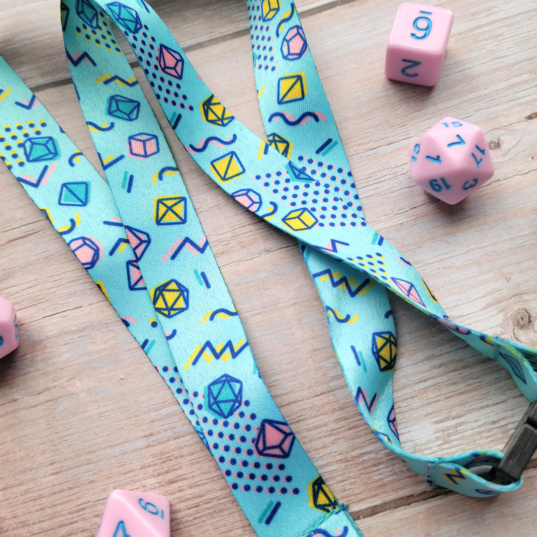 90s Dice Lanyard - Geeky merchandise for people who play D&D - Merch to wear and cute accessories and stationery Paola's Pixels