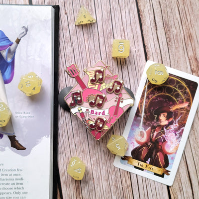 Bard Bardic Inspiration Magnetic Enamel Pin - Geeky merchandise for people who play D&D - Merch to wear and cute accessories and stationery Paola's Pixels