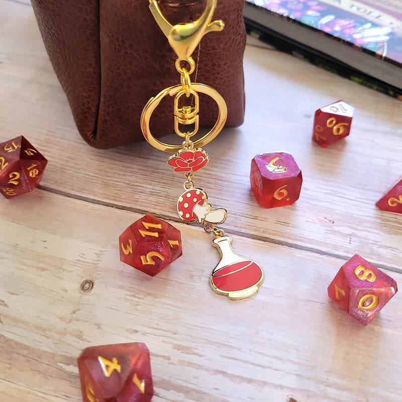Red Potion Enamel Keychain - Geeky merchandise for people who play D&D - Merch to wear and cute accessories and stationery Paola&