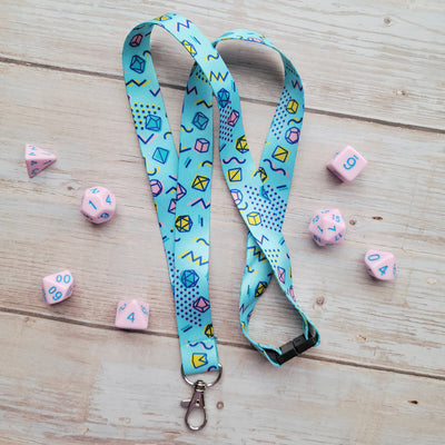 90s Dice Lanyard - Geeky merchandise for people who play D&D - Merch to wear and cute accessories and stationery Paola's Pixels