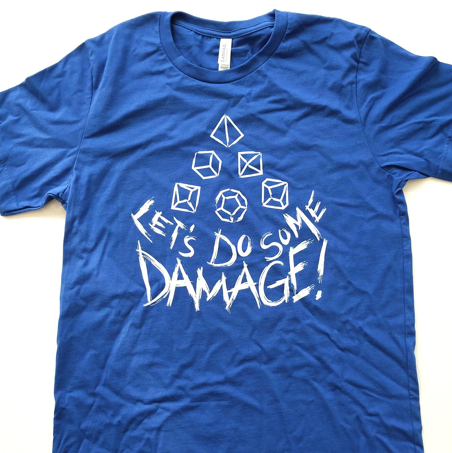 White Let's Do Some Damage Shirt - Geeky merchandise for people who play D&D - Merch to wear and cute accessories and stationery Paola's Pixels