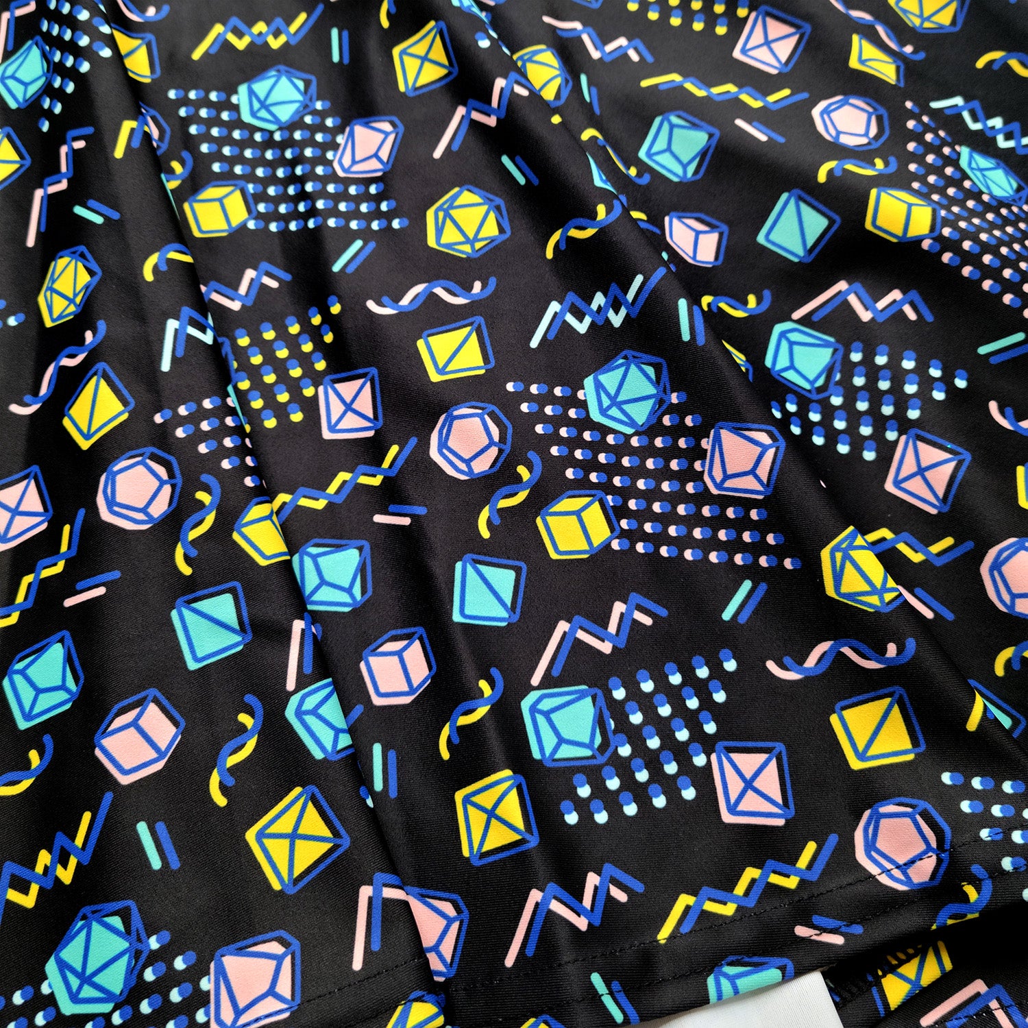 Black 90s Dice Skater Skirt - Geeky merchandise for people who play D&D - Merch to wear and cute accessories and stationery Paola's Pixels