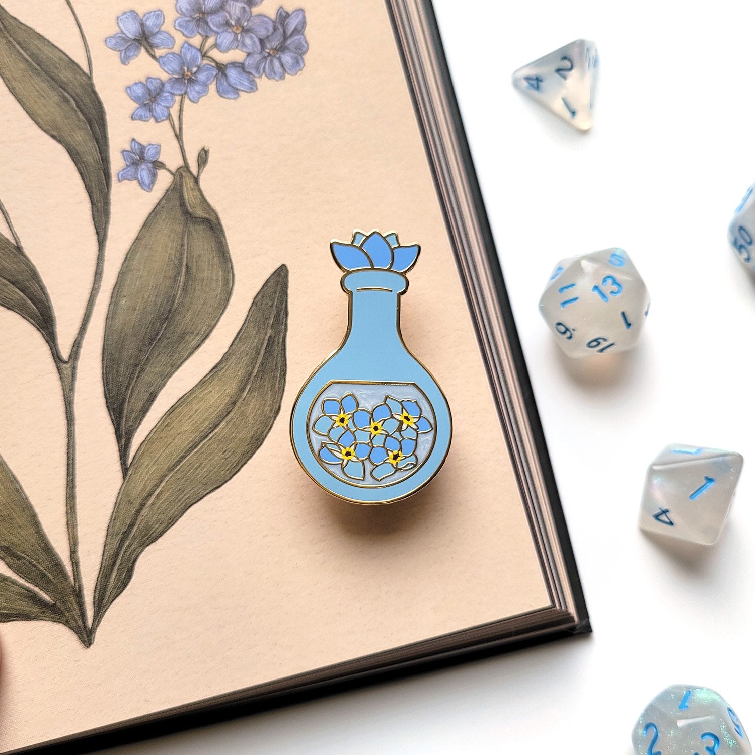 Seconds Sale! Blue Forget-Me-Not Potion Enamel Pin - Geeky merchandise for people who play D&D - Merch to wear and cute accessories and stationery Paola's Pixels