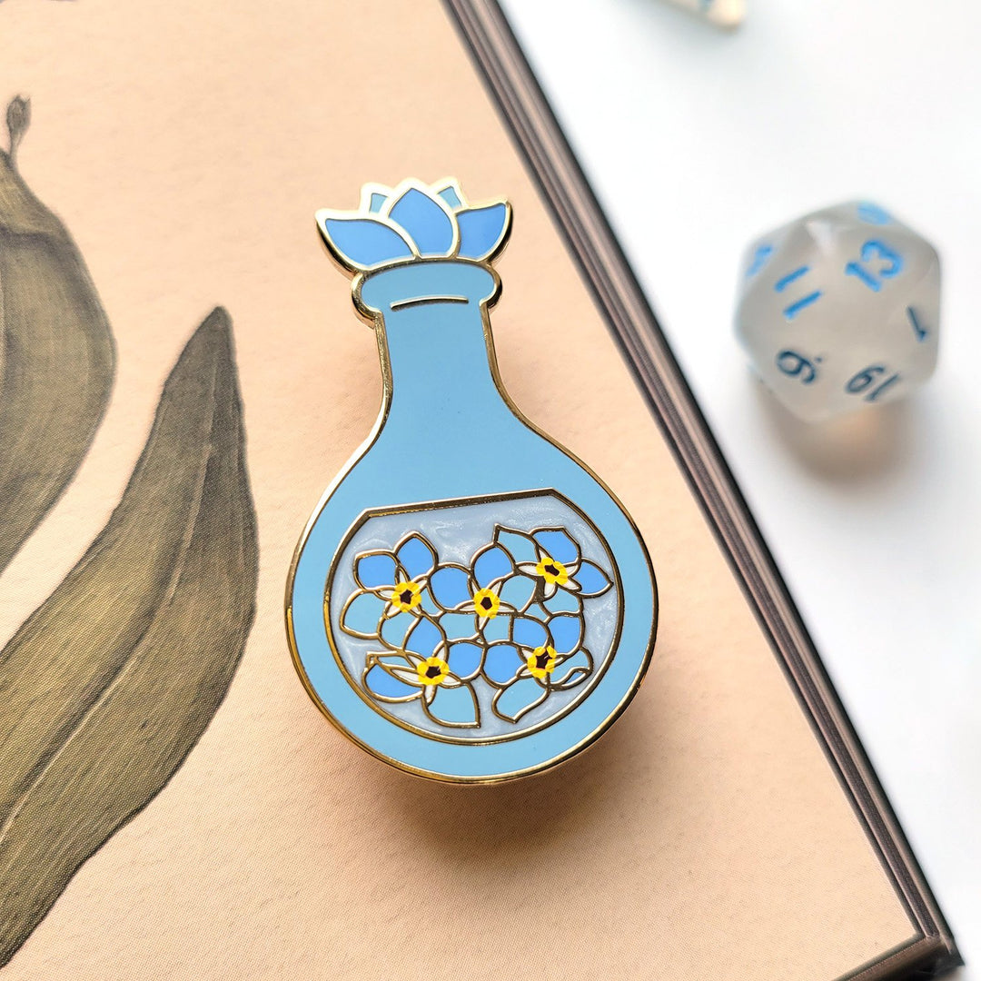 Seconds Sale! Blue Forget-Me-Not Potion Enamel Pin - Geeky merchandise for people who play D&D - Merch to wear and cute accessories and stationery Paola's Pixels