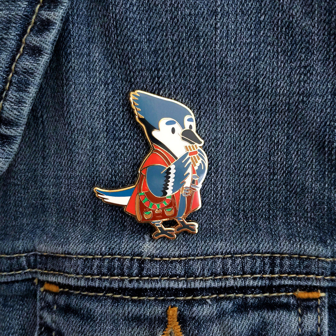 Blue Jay Bard Enamel Pin - Geeky merchandise for people who play D&D - Merch to wear and cute accessories and stationery Paola's Pixels
