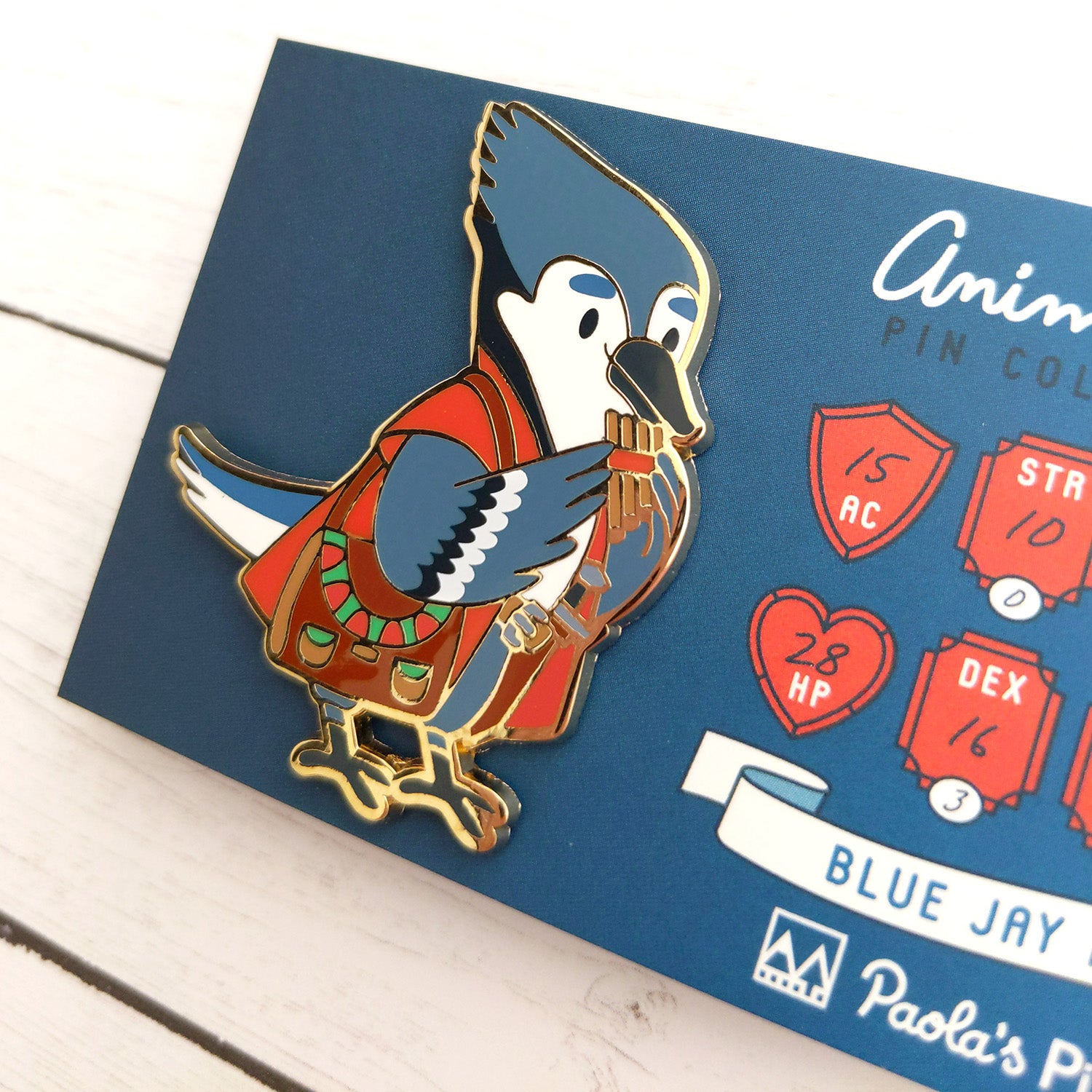 Blue Jay Bard Enamel Pin - Geeky merchandise for people who play D&D - Merch to wear and cute accessories and stationery Paola's Pixels