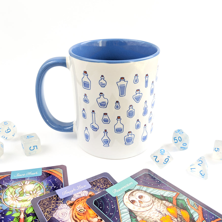 Blue Mana Potions Mug - Geeky merchandise for people who play D&D - Merch to wear and cute accessories and stationery Paola's Pixels