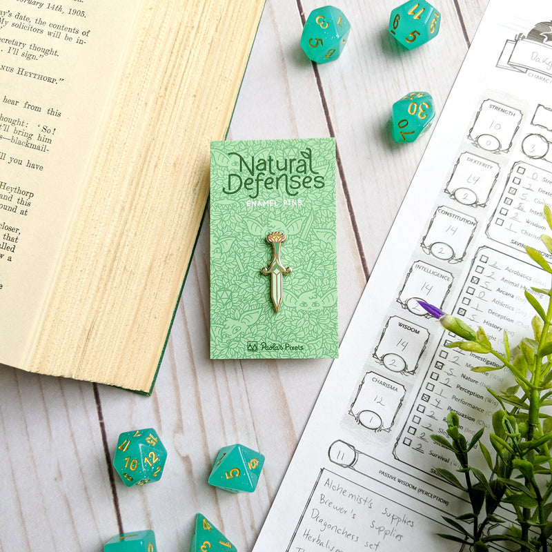 Lotus Dagger Pin - Geeky merchandise for people who play D&D - Merch to wear and cute accessories and stationery Paola&