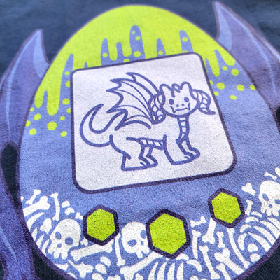 Dragon Tamagotchi Women's Shirt - Geeky merchandise for people who play D&D - Merch to wear and cute accessories and stationery Paola's Pixels
