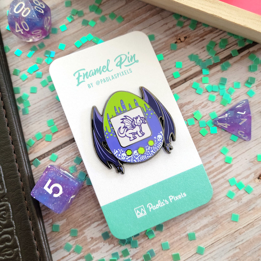 Dragon Tamagotchi Pin - Geeky merchandise for people who play D&D - Merch to wear and cute accessories and stationery Paola's Pixels
