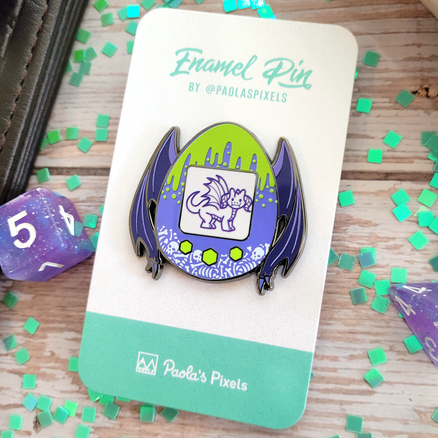 Dragon Tamagotchi Pin - Geeky merchandise for people who play D&D - Merch to wear and cute accessories and stationery Paola's Pixels