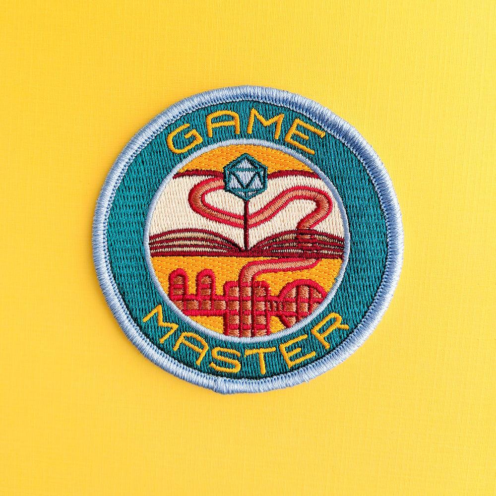 Game Master Patch - Geeky merchandise for people who play D&D - Merch to wear and cute accessories and stationery Paola's Pixels