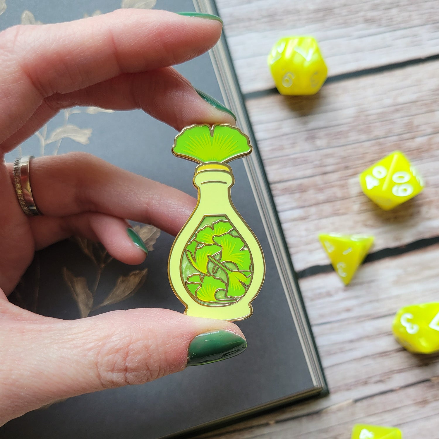 Green Ginkgo Potion Enamel Pin - Geeky merchandise for people who play D&D - Merch to wear and cute accessories and stationery Paola's Pixels