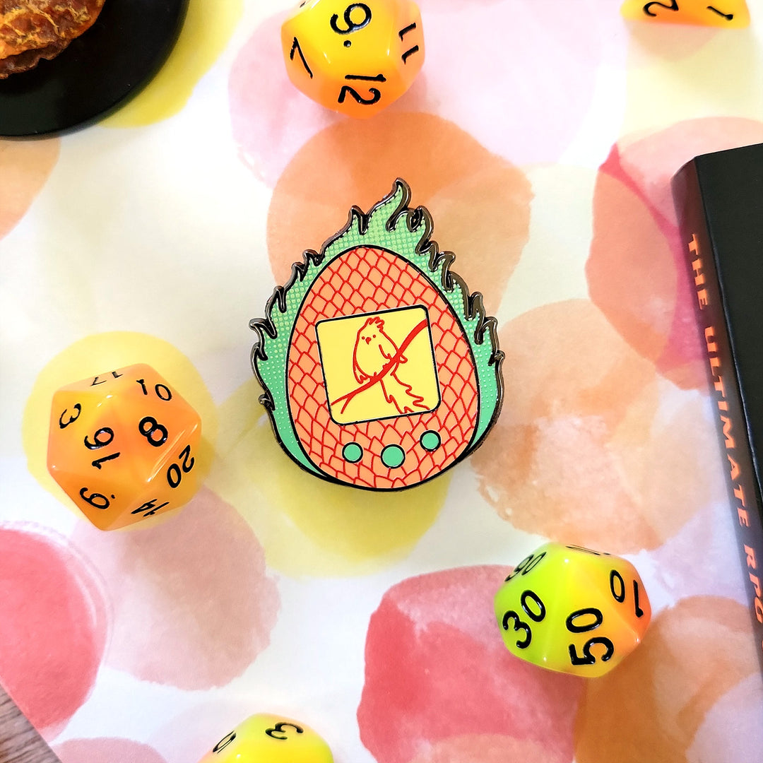 Phoenix Tamagotchi Pin - Geeky merchandise for people who play D&D - Merch to wear and cute accessories and stationery Paola's Pixels