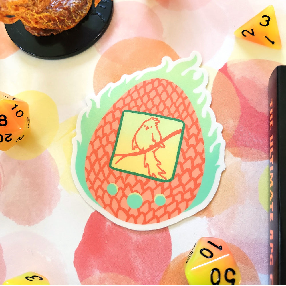 Phoenix Tamagotchi Sticker - Geeky merchandise for people who play D&D - Merch to wear and cute accessories and stationery Paola's Pixels