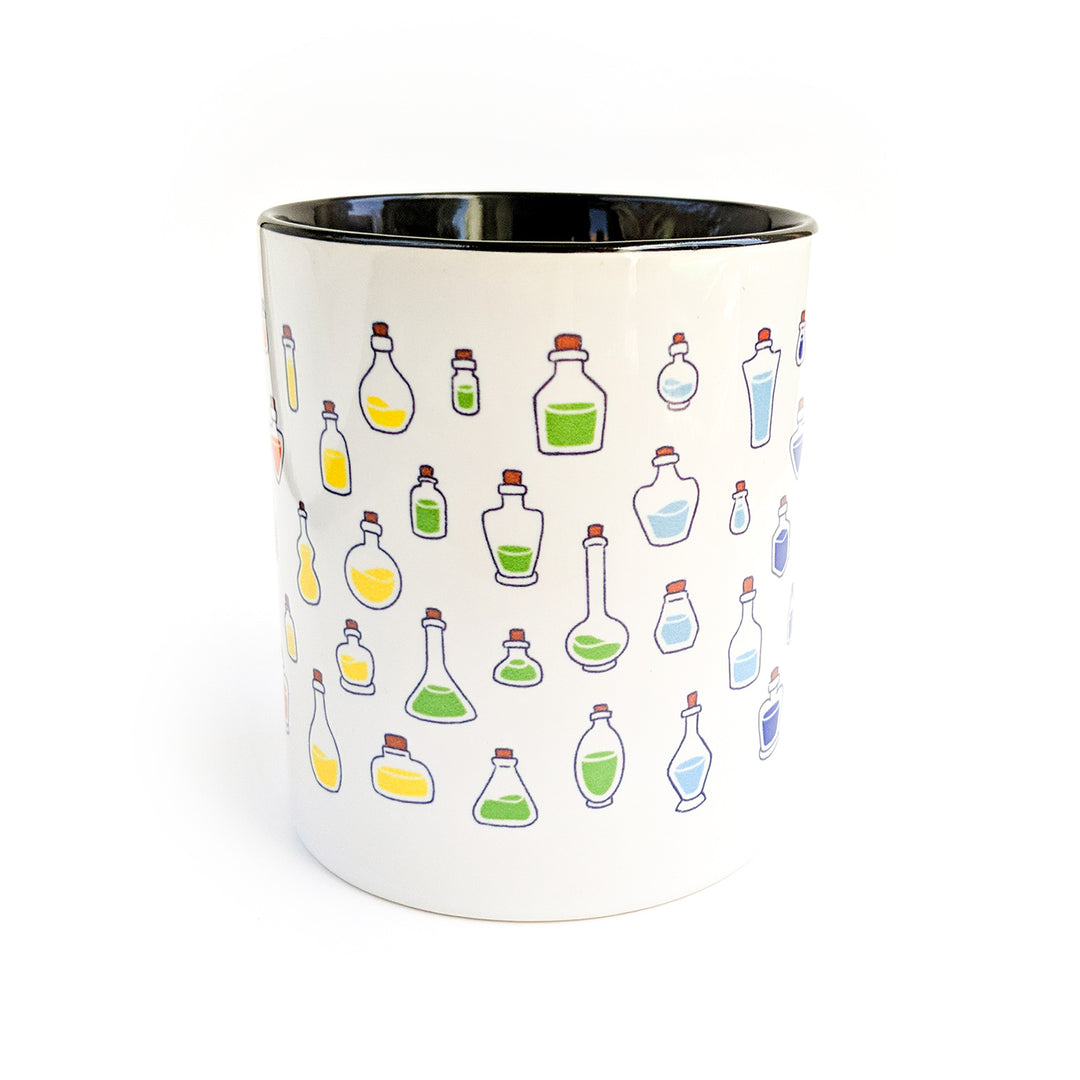 Rainbow Healing Potions Mug - Geeky merchandise for people who play D&D - Merch to wear and cute accessories and stationery Paola's Pixels
