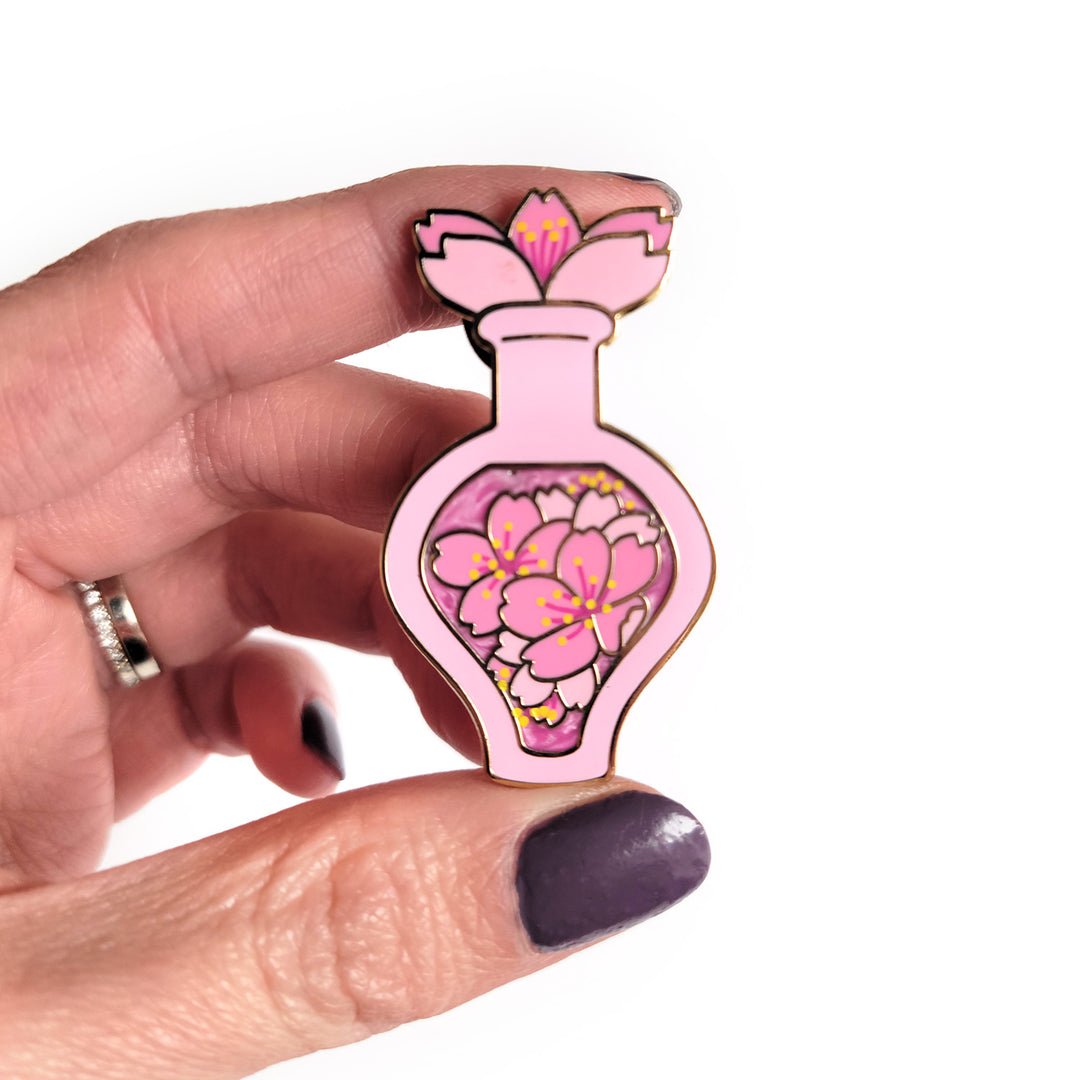 Seconds Sale! Pink Cherry Blossom Potion Enamel Pin - Geeky merchandise for people who play D&D - Merch to wear and cute accessories and stationery Paola's Pixels