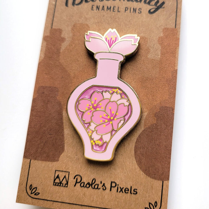 Seconds Sale! Pink Cherry Blossom Potion Enamel Pin - Geeky merchandise for people who play D&D - Merch to wear and cute accessories and stationery Paola's Pixels