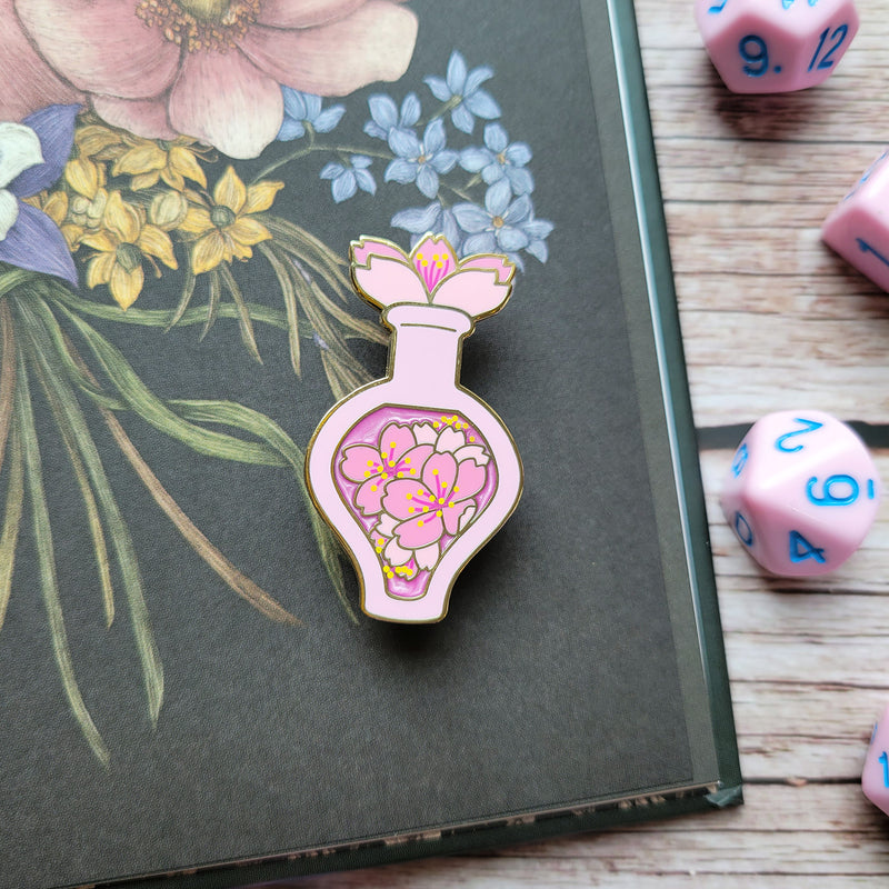 Pink Cherry Blossom Potion Enamel Pin - Geeky merchandise for people who play D&D - Merch to wear and cute accessories and stationery Paola&