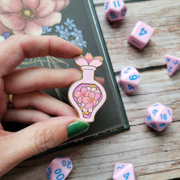 Seconds Sale! Pink Cherry Blossom Potion Enamel Pin - Geeky merchandise for people who play D&D - Merch to wear and cute accessories and stationery Paola's Pixels