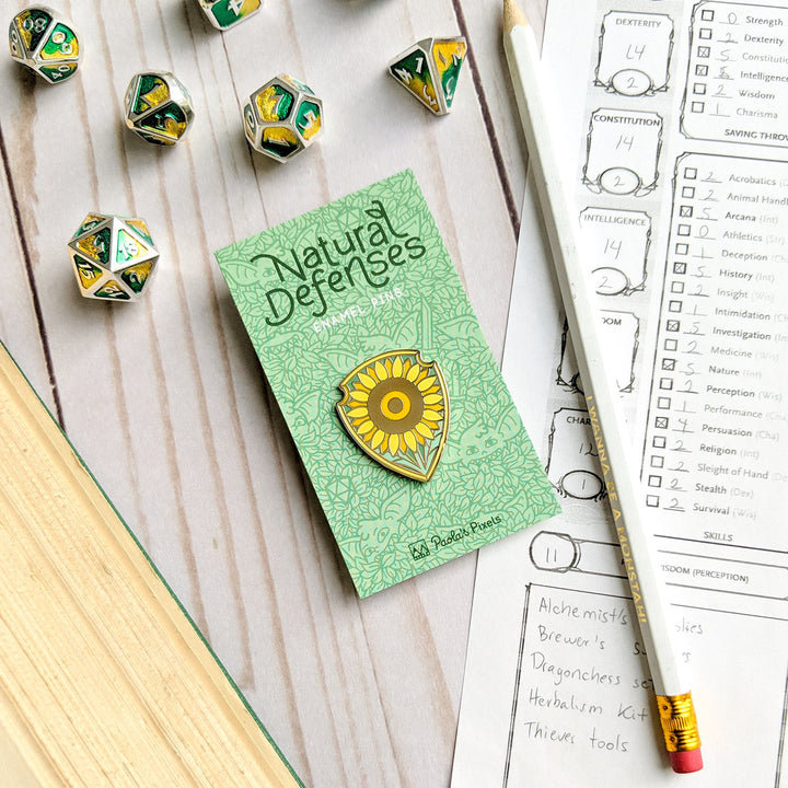 Seconds Sale! Shield of Helianthus Pin - Geeky merchandise for people who play D&D - Merch to wear and cute accessories and stationery Paola's Pixels