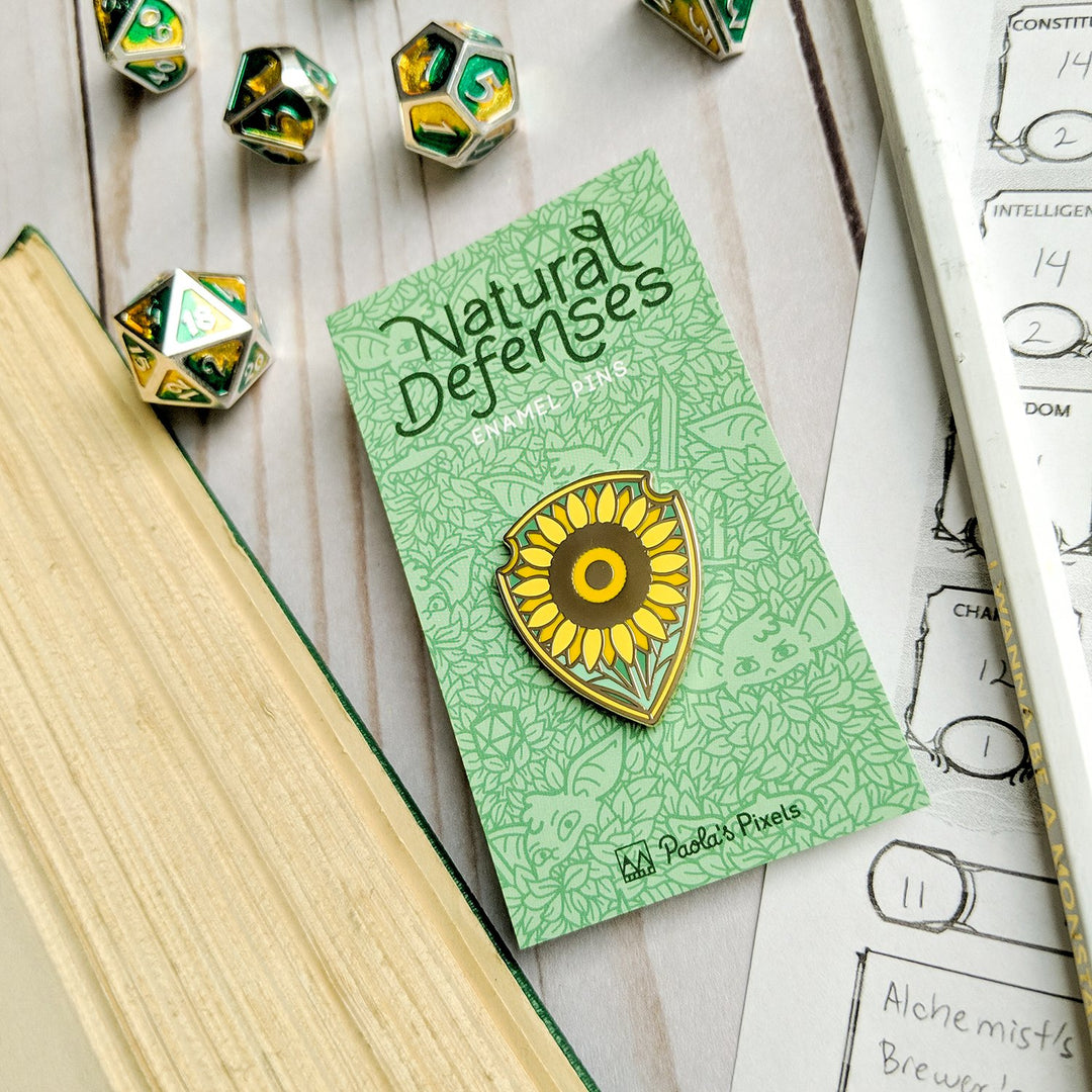 Seconds Sale! Shield of Helianthus Pin - Geeky merchandise for people who play D&D - Merch to wear and cute accessories and stationery Paola's Pixels