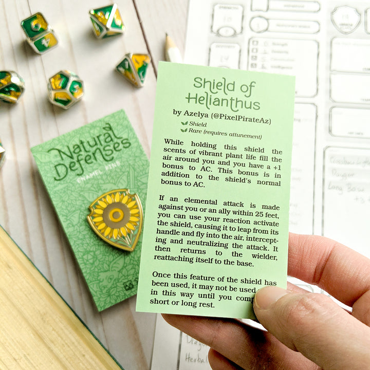 Shield of Helianthus Pin - Geeky merchandise for people who play D&D - Merch to wear and cute accessories and stationery Paola's Pixels