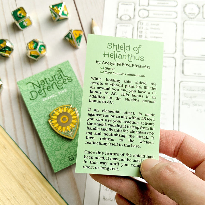 Seconds Sale! Shield of Helianthus Pin - Geeky merchandise for people who play D&D - Merch to wear and cute accessories and stationery Paola's Pixels