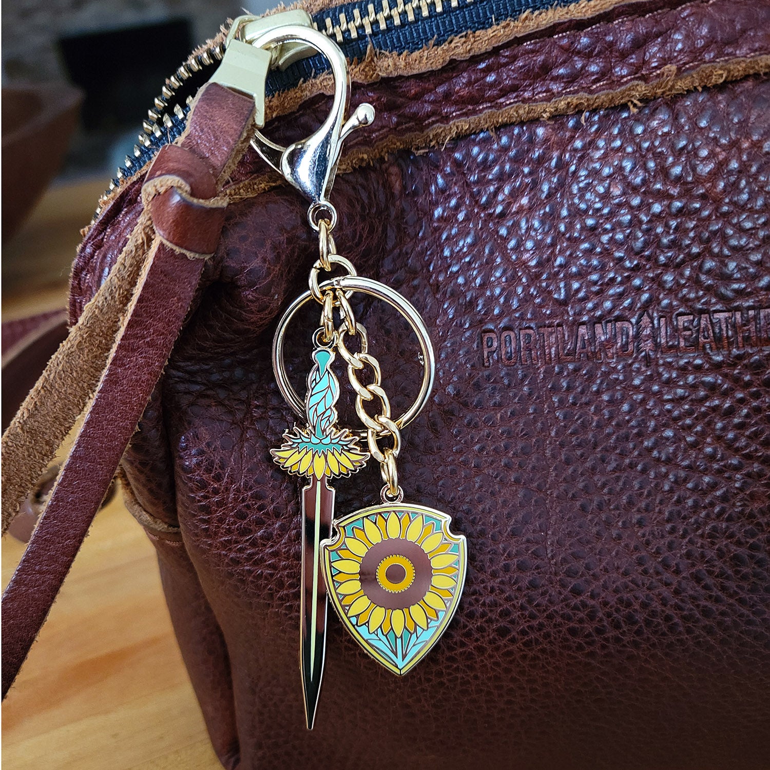 Sunflower Sword and Shield Enamel Keychain - Geeky merchandise for people who play D&D - Merch to wear and cute accessories and stationery Paola's Pixels