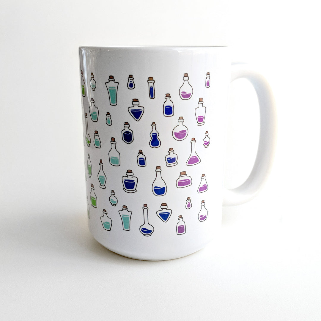 Bigger Rainbow Healing Potions Mug - Geeky merchandise for people who play D&D - Merch to wear and cute accessories and stationery Paola's Pixels