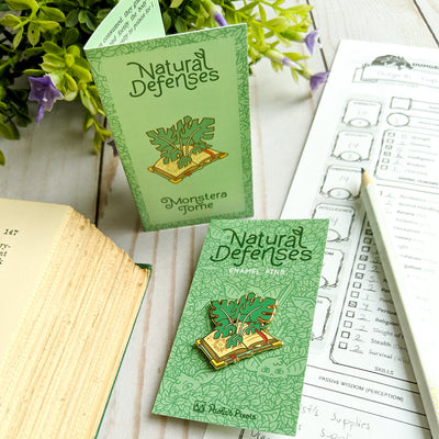 Monstera Tome Pin - Geeky merchandise for people who play D&D - Merch to wear and cute accessories and stationery Paola's Pixels