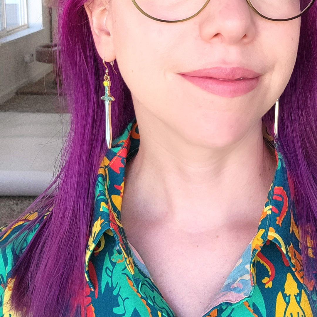 Tulip Sword Earrings - Geeky merchandise for people who play D&D - Merch to wear and cute accessories and stationery Paola's Pixels