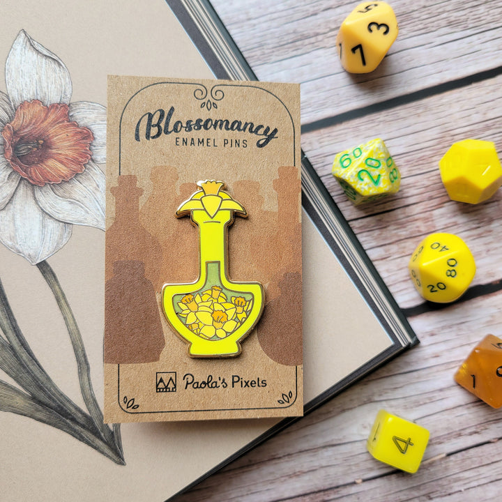 Yellow Daffodil Potion Enamel Pin - Geeky merchandise for people who play D&D - Merch to wear and cute accessories and stationery Paola's Pixels