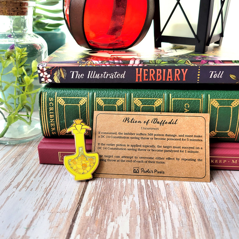 Yellow Daffodil Potion Enamel Pin - Geeky merchandise for people who play D&D - Merch to wear and cute accessories and stationery Paola&